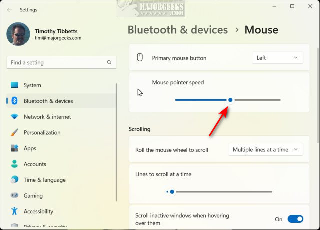 Under Mouse pointer speed, adjust the slider left (slower) or right ...